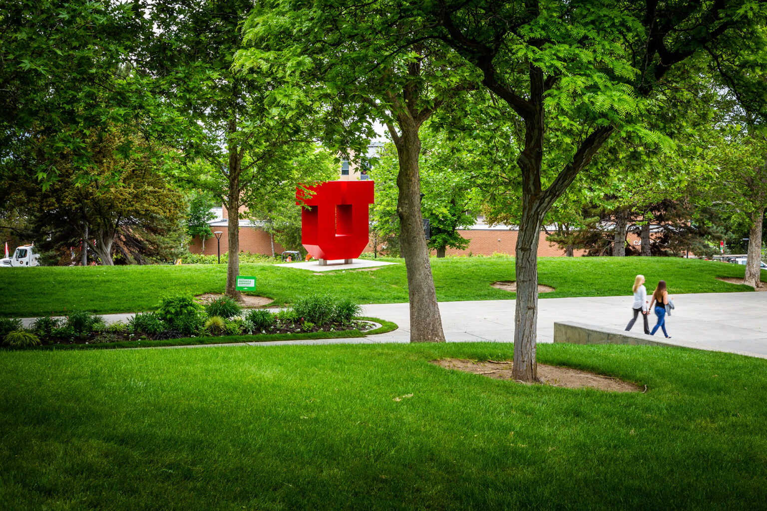 Spring-Block-U-2_2000-1536×1024 the block U, there's a couple of students walking by on the side